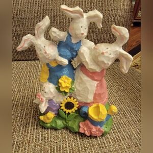 Colorful Easter decoration. Has four white bunnies, Great Condition.